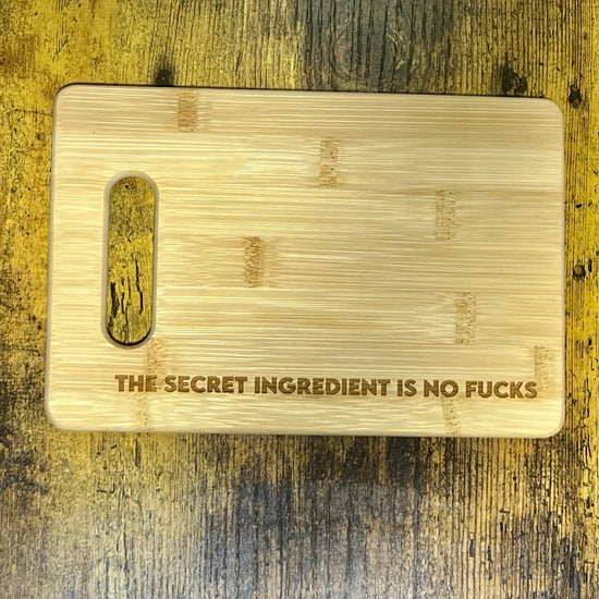 Funny Gift The Secret Ingredient is No Fucks Charcuterie Cheese Cutting Board-cheese board-Crimson and Clover Studio